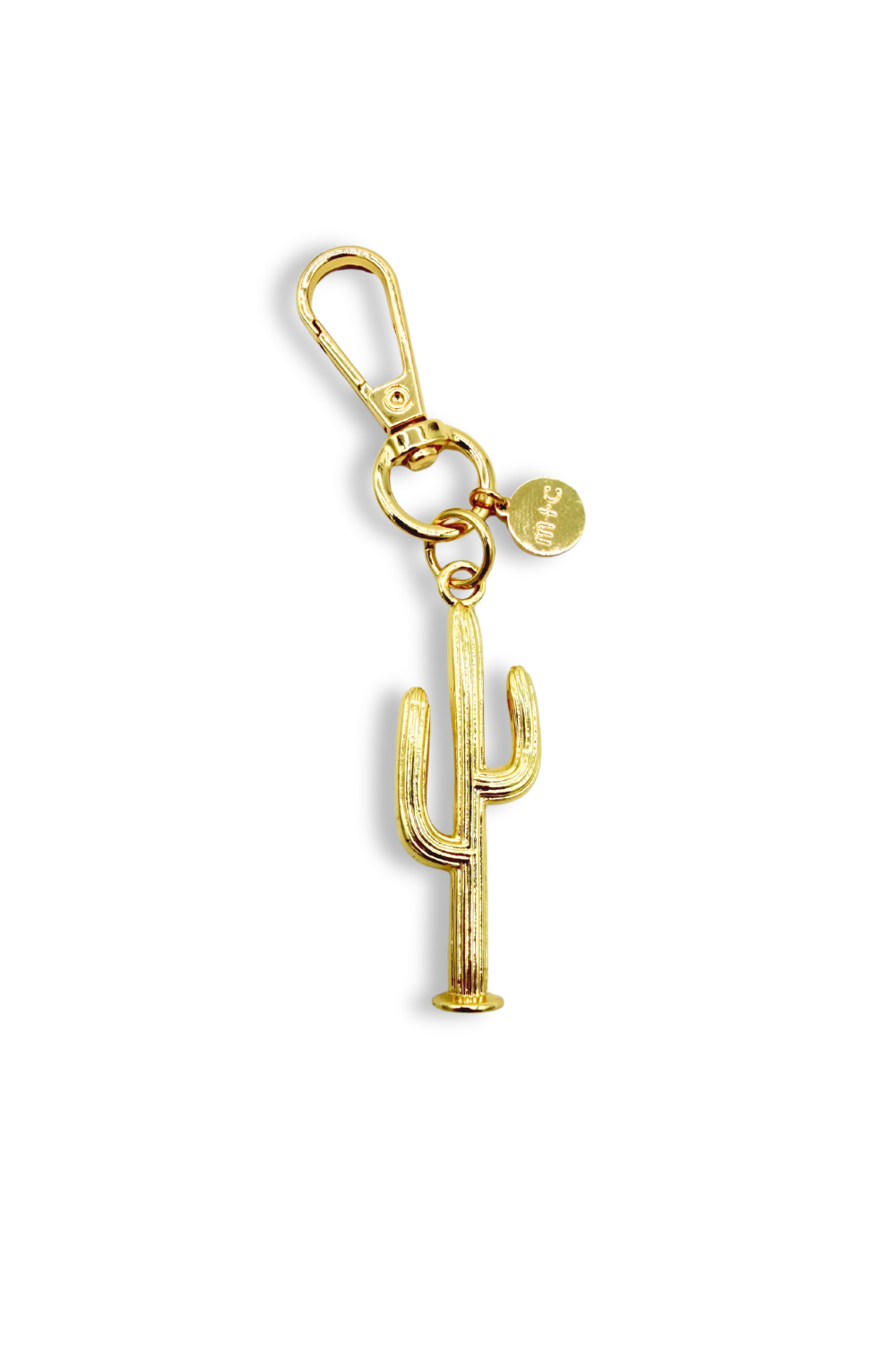 Gold cactus-shaped keychain on a white background