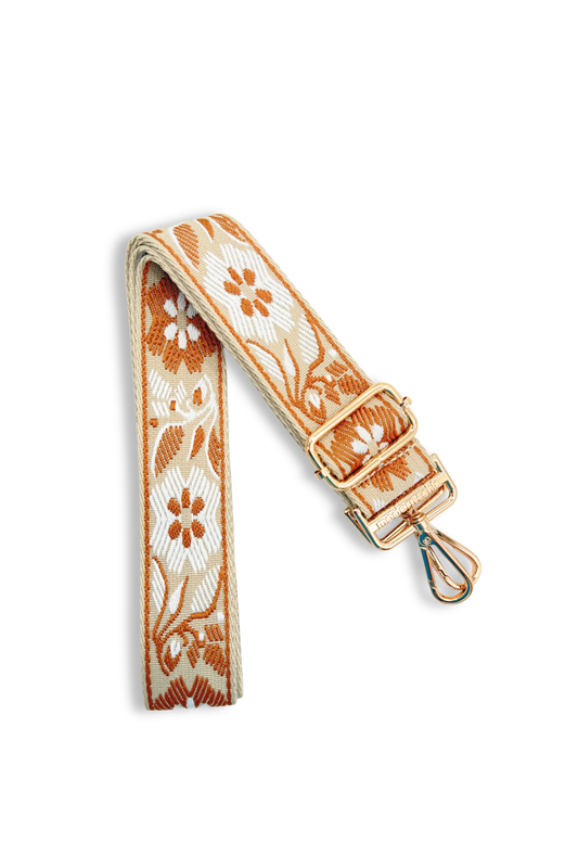 Bronze floral embroidered strap on a white background