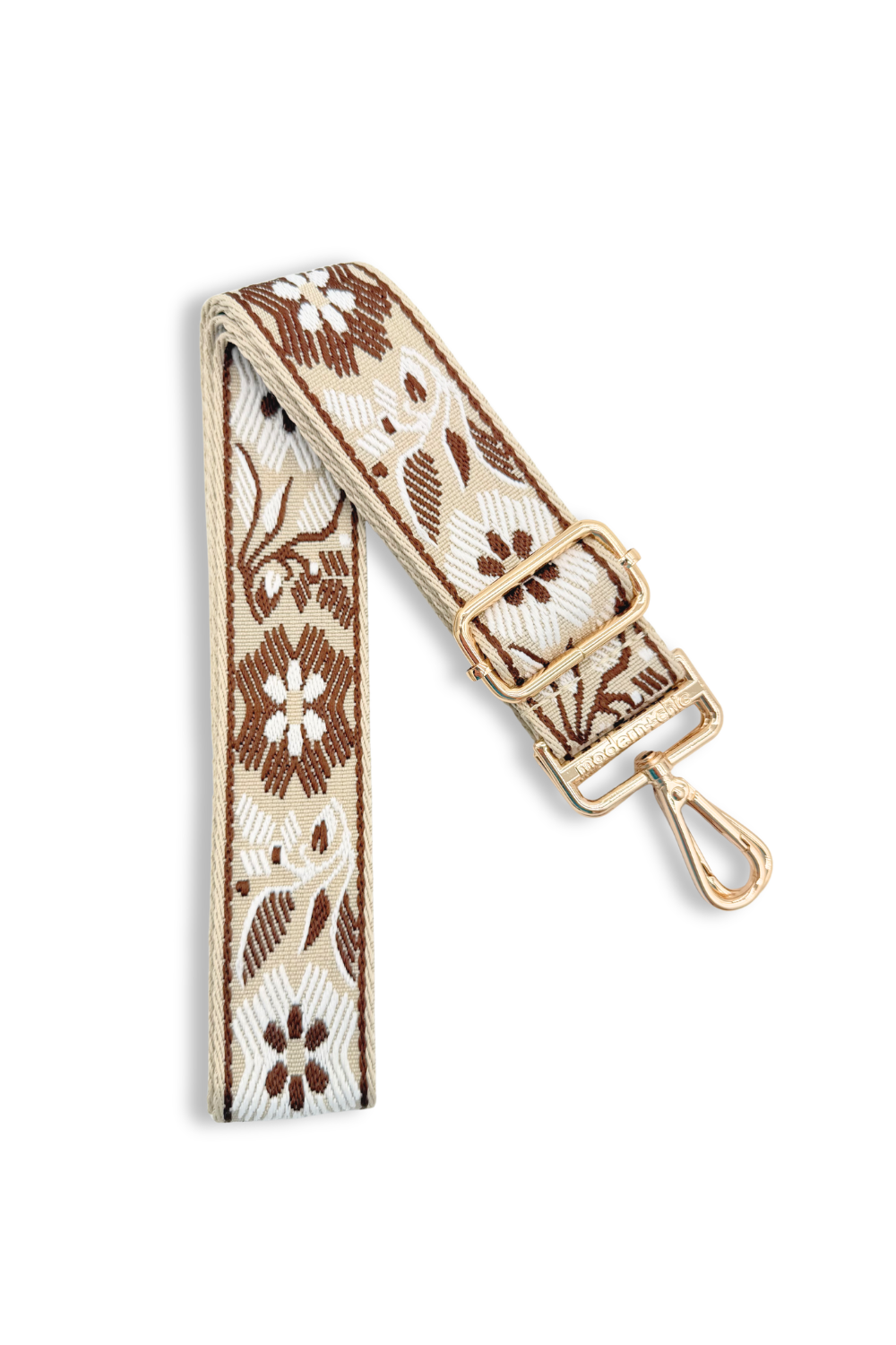 Russet Brown floral bag strap with gold hardware on a white background