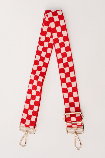 Red and light pink Drury Road Lizzie Checkered Purse Strap for Crossbody Bags on a white background.