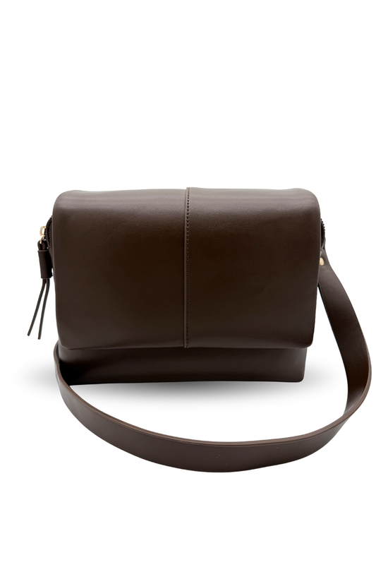 Brown leather shoulder bag on a white background