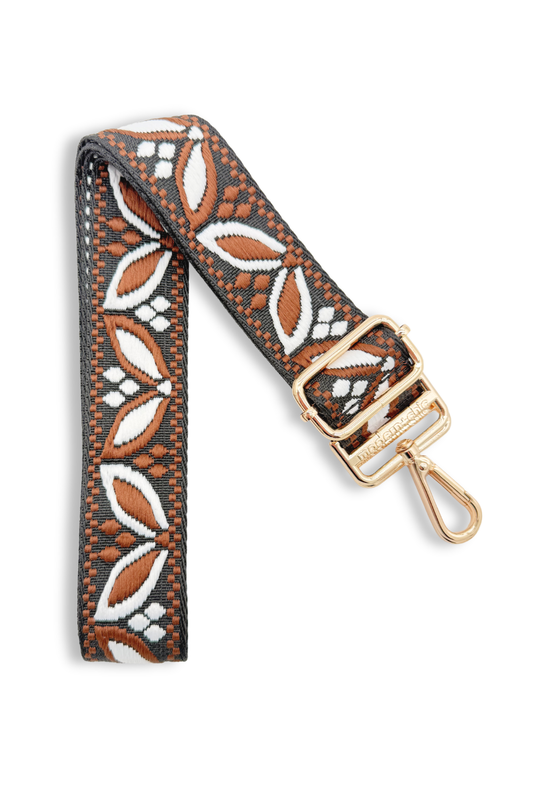 Patterned saddle brown colored strap with a gold clasp on a white background