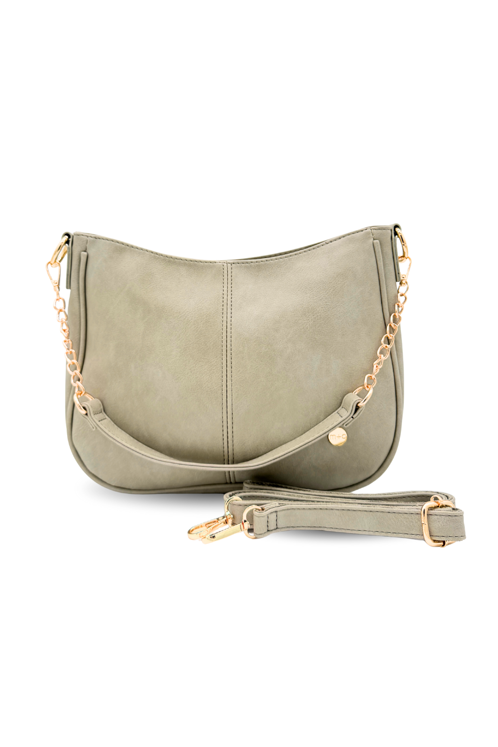 A pebble or pale green Marissa Vegan Leather Saddle Crossbody Bag | Drury Road