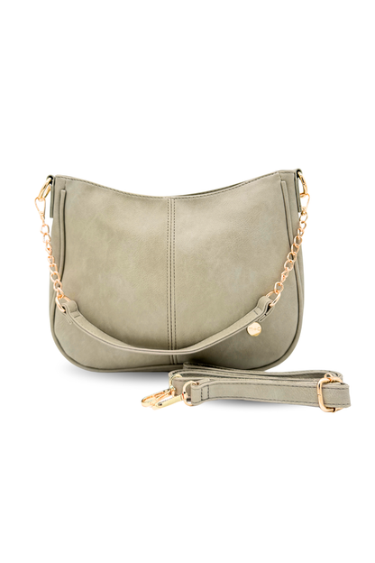 A pebble or pale green Marissa Vegan Leather Saddle Crossbody Bag | Drury Road
