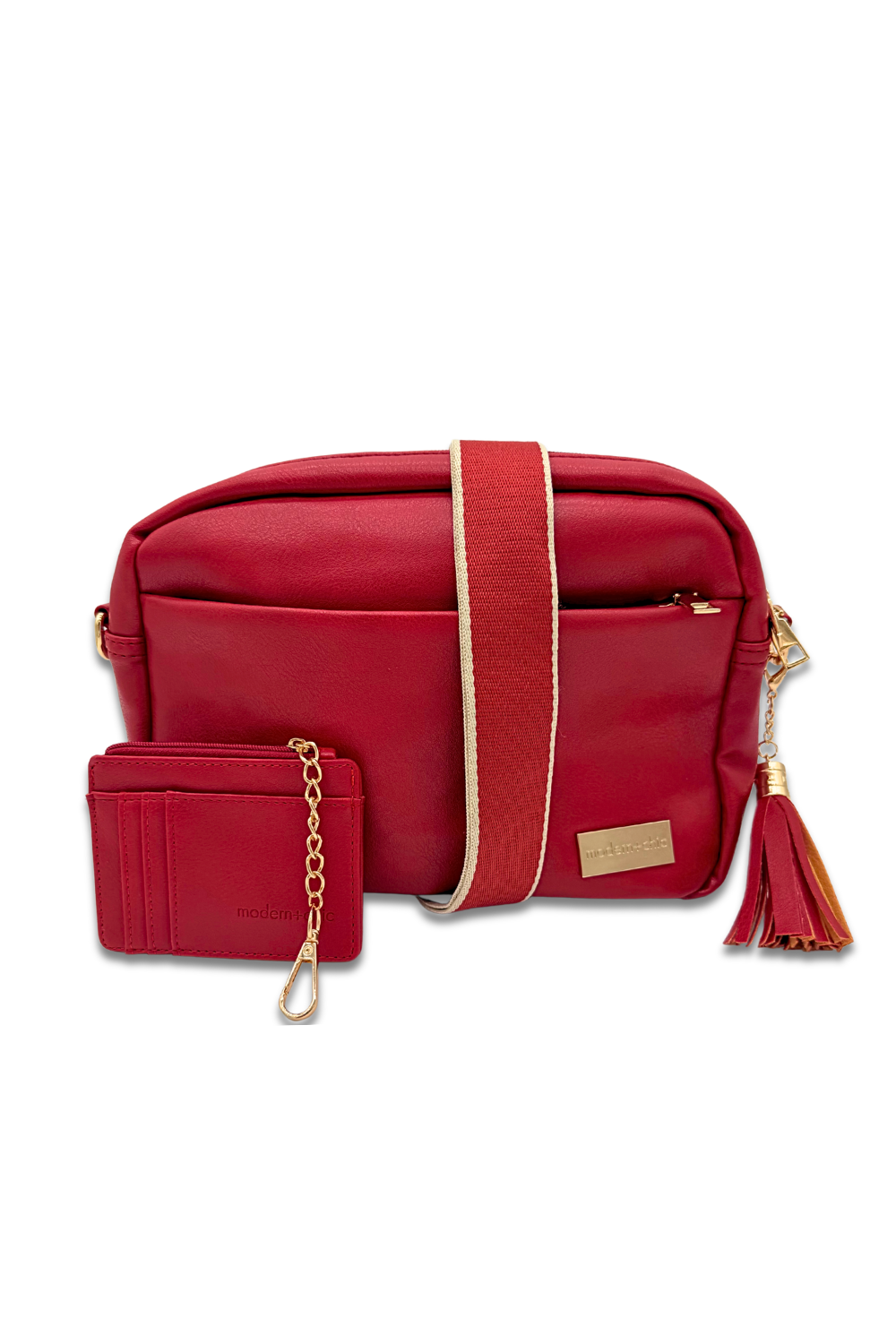 Red handbag with matching wallet on a white background