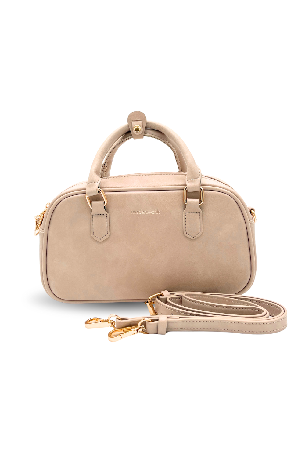 A cream Drury Road Remi Vegan Leather Crossbody Purse with gold hardware on white background. 
