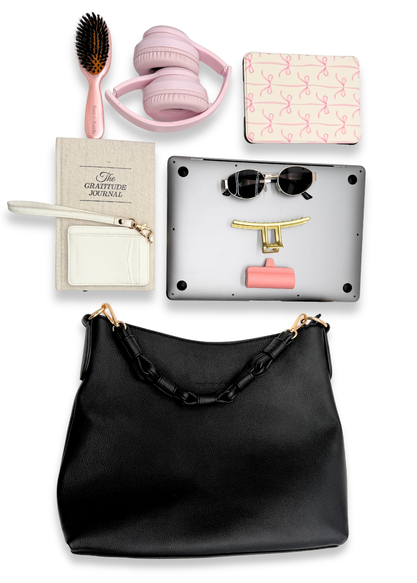 Black Drury Road Sawyer Convertible Slouchy Tote Bag for Women with various accessories including a hairbrush, headphones, and a laptop on a white background. 
