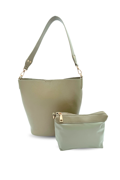 A green Drury Road vegan leather Sophie Bucket Bag and coordinating zipper pouch for Women –  on a white background. 